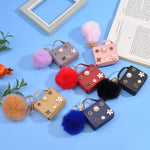 Load image into Gallery viewer, Mini Flower Wallet Keychain – Faux Leather Charm with Pom Pom &amp; Pearl Accents
