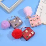 Load image into Gallery viewer, Mini Flower Wallet Keychain – Faux Leather Charm with Pom Pom &amp; Pearl Accents
