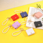 Load image into Gallery viewer, Pearl Strap Coin Purse Keychain – Faux Leather Bag Charm
