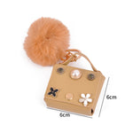 Load image into Gallery viewer, Mini Flower Wallet Keychain – Faux Leather Charm with Pom Pom &amp; Pearl Accents
