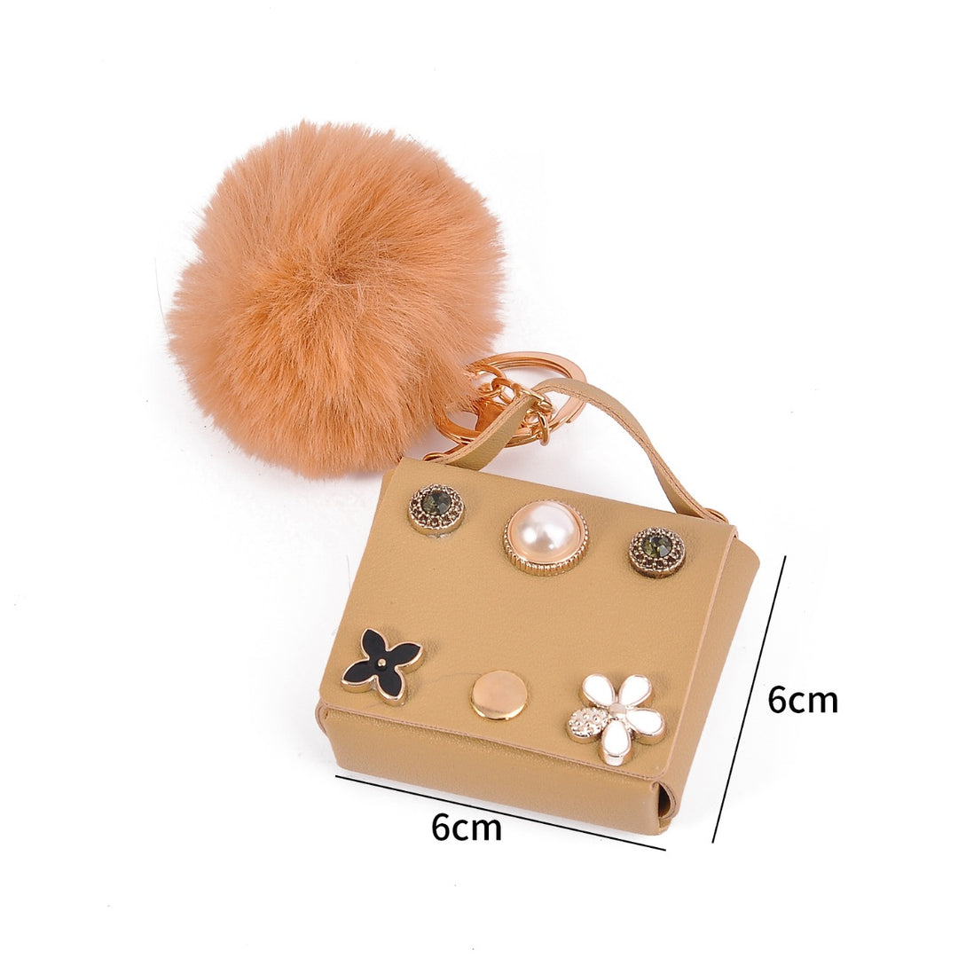 Mini Flower Wallet Keychain – Faux Leather Charm with Pom Pom & Pearl Accents