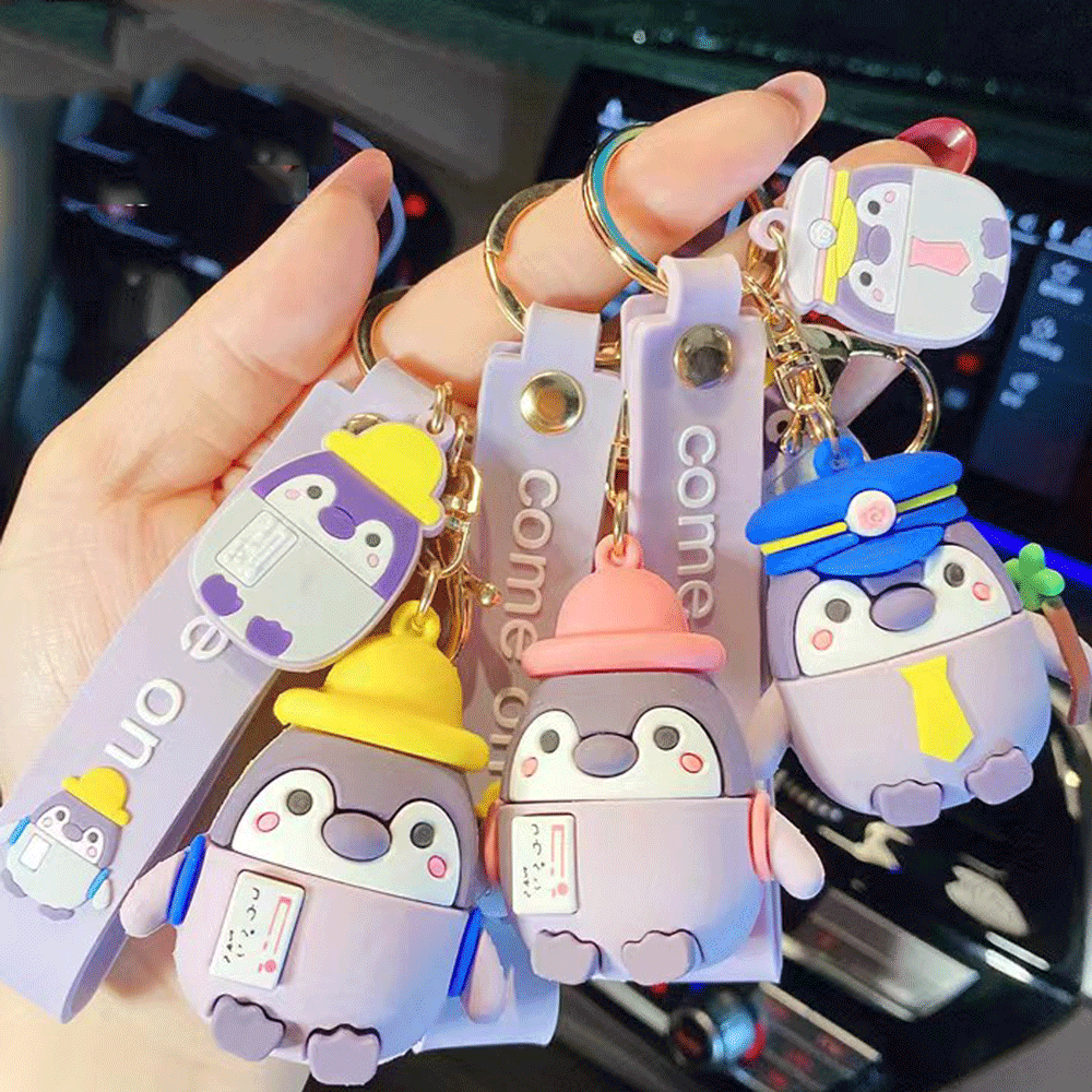 Travel with penguin keychain. - TinyBo