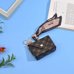 Load image into Gallery viewer, Luxury-Inspired Mini Wallet Keychain – Printed Faux Leather with Scarf Accent
