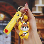 Load image into Gallery viewer, Cute animal cartoon keychain in yellow bear costume with “Good Luck” strap
