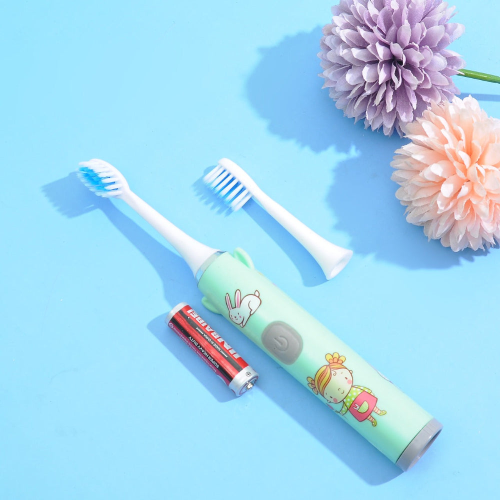Kids cartoon-themed electric toothbrush with detachable heads & AA battery
