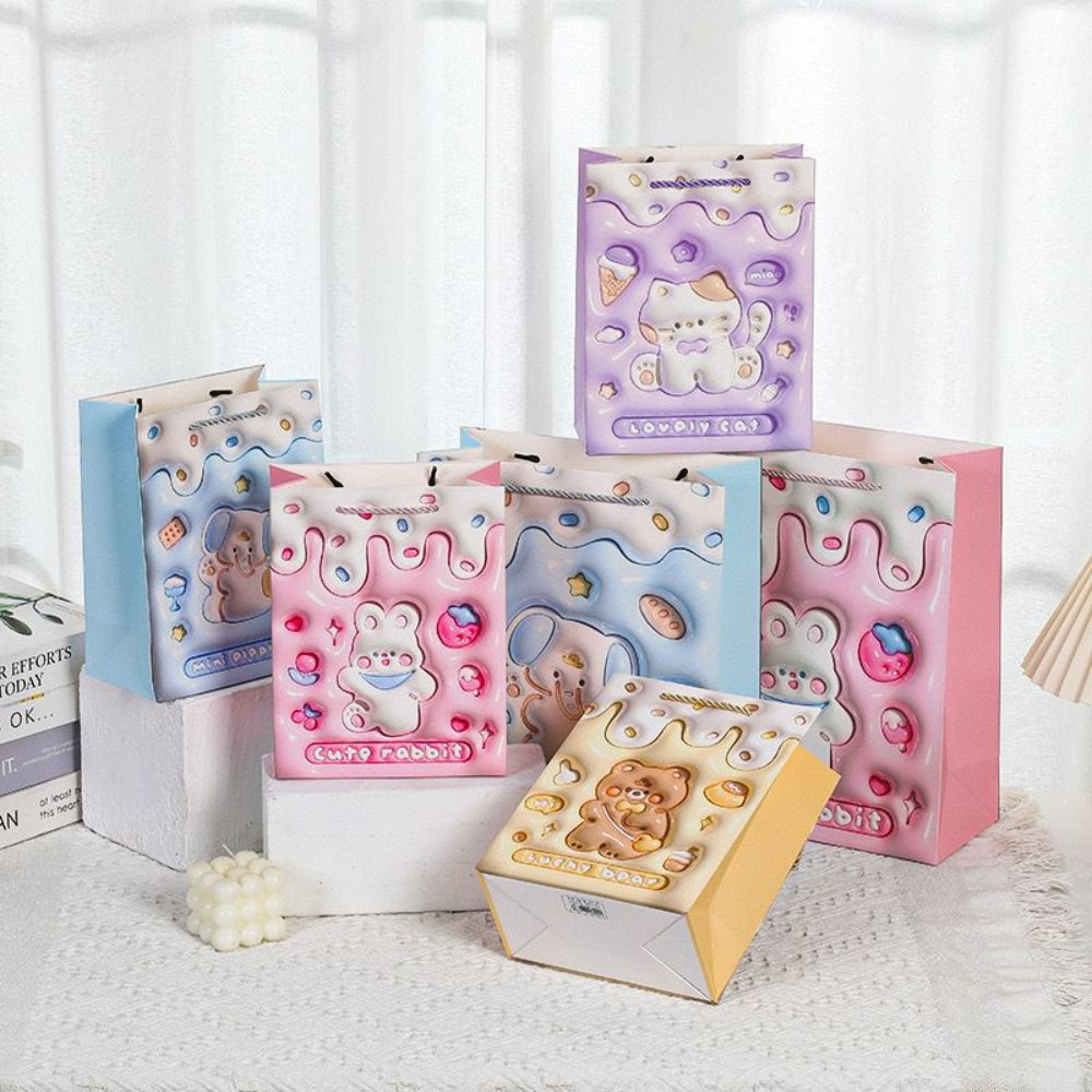 Set of pastel cartoon gift bags featuring kawaii animal designs - TinyBo