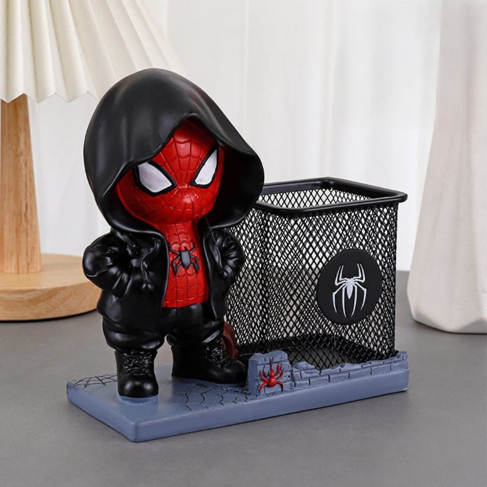 Chibi Spider-Man figurines beside pen holders - TinyBo